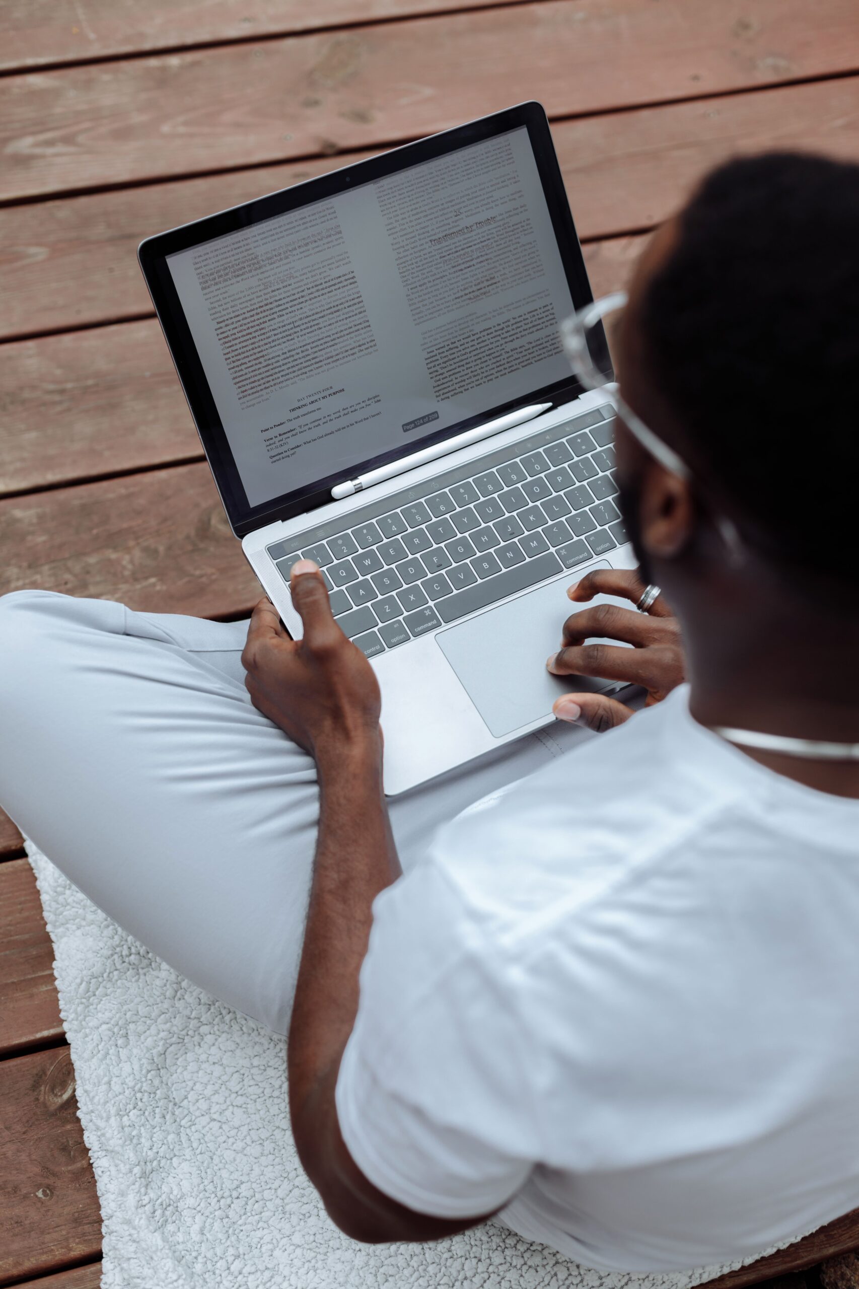 Remote writer typing an article at a home desk